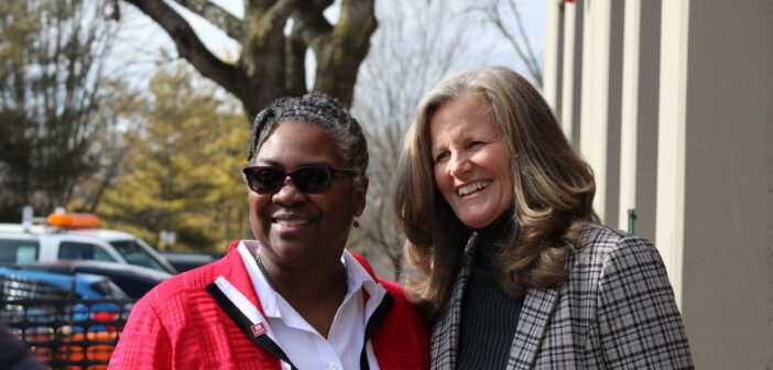 Dr. Anita Thomas and Senator Laura Ellman stand together for photos after the ribbon cutting.