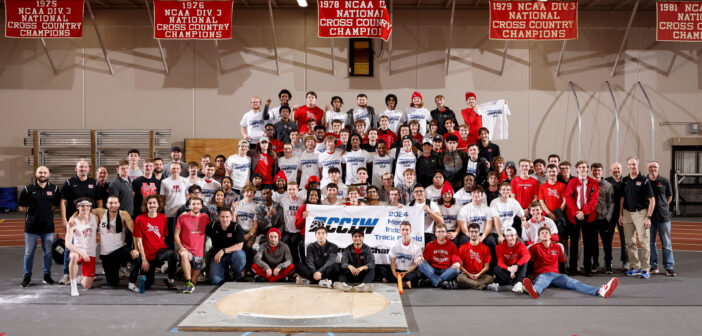 Photo of Men's Track & Field Team winning conference