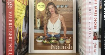 A photograph of the cookbook, "Nourish," by Gisele Bündchen.
